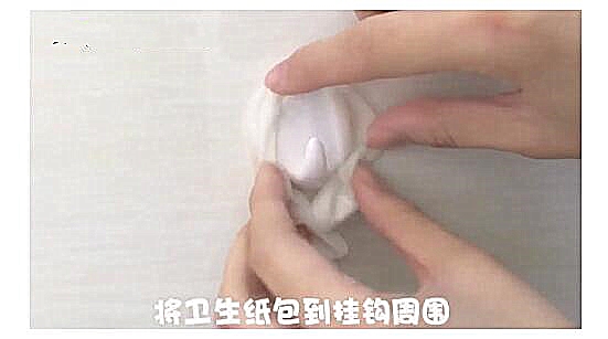 挂钩贴在墙上怎么去除