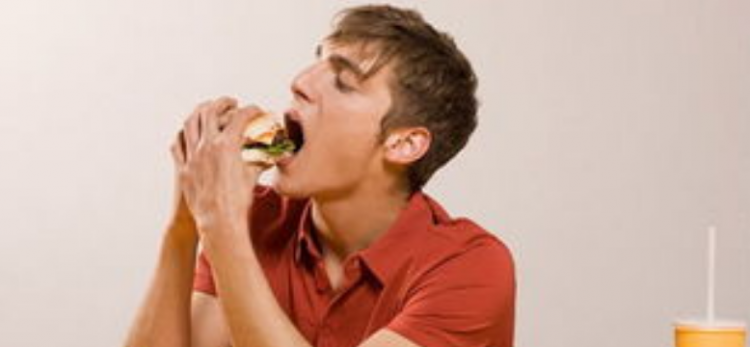 狼吞虎咽是什么意思