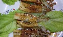 怎样做美味的豆腐皮金针菇卷？