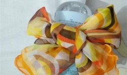 方巾丝巾的小蝴蝶结式系法